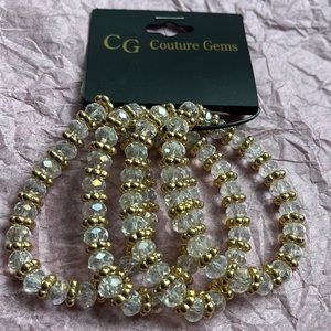 Gold in clear beaded bracelet a set of four